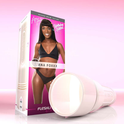 Birthday Edition Fleshlight packaging with Ana Foxxx in lingerie next to a white pearl case with cap on.